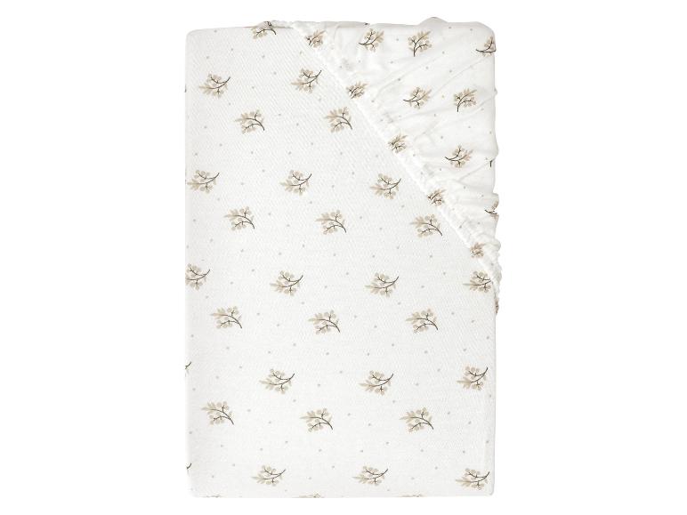 Baby ledikantlaken met bloemenprint.