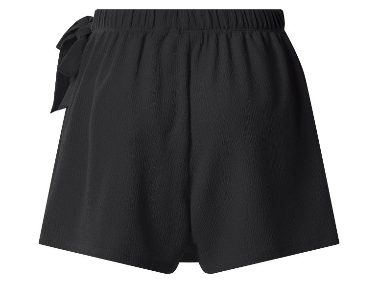 Zwarte shorts met elastische tailleband en decoratieve strik.