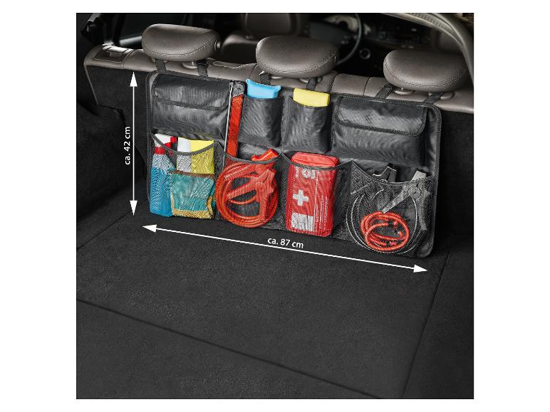 Organisateur de coffre de voiture avec des poches pour outils, câbles de démarrage et trousse de premiers soins