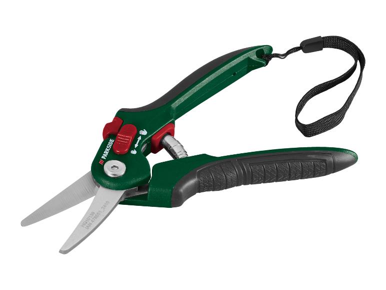 Parkside grasschaar met groene handvatten en een zwarte polsband