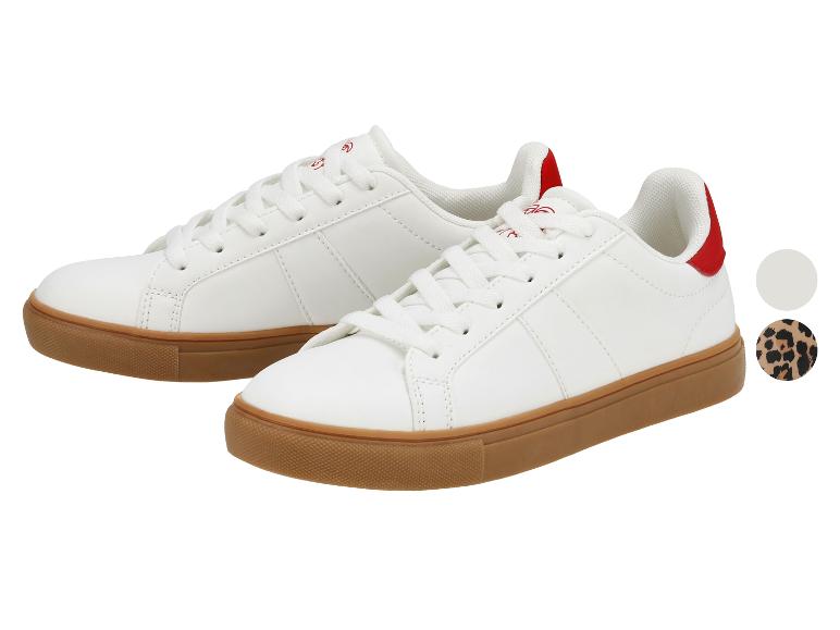 Witte sneakers met rode hielaccenten en rubberen zolen, met kleuropties.