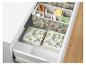 Opbergers voor laden met citroenprint, dividers en opvouwbare dozen.