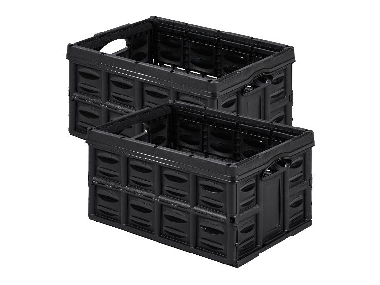 Twee zwarte opvouwbare plastic opbergkratten