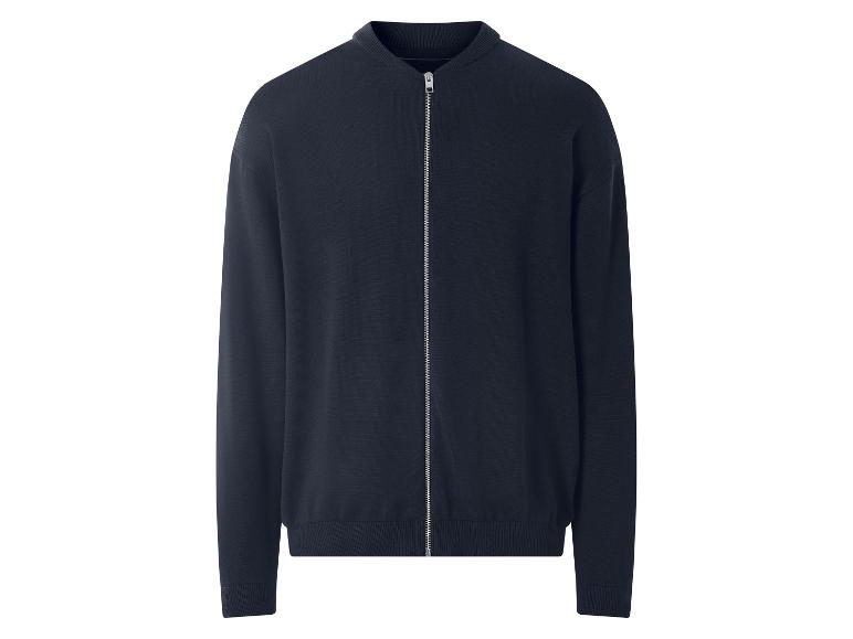 Cardigan zippé bleu marine sur fond blanc.