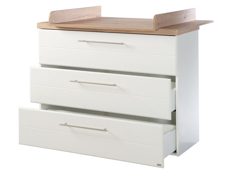 Commode blanche à trois tiroirs avec plan à langer.