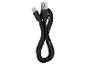 Câble de charge USB-C noir avec connecteur USB-A, enroulé en forme de huit.