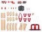 Ensemble de jouets de pompiers avec train, hélicoptère, figurines, rails et accessoires.