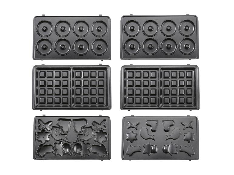Een grillplaat met uitwisselbare platen voor wafels, donuts en kinderpatronen.