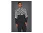 Homme en veste de sport noire à motifs réfléchissants et pantalon de sport noir.