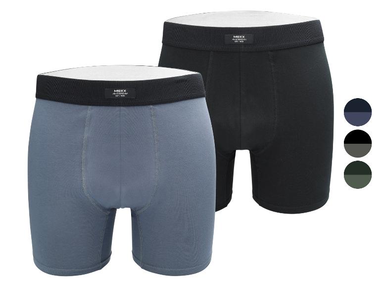 Twee Mexx herenboxers: één blauw en één zwart, met kleurenpalet.