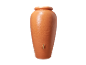 Grande jardinière terracotta avec robinet pour la collecte d'eau de pluie.
