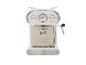 Beige espressomachine met een retro design en metallic details.