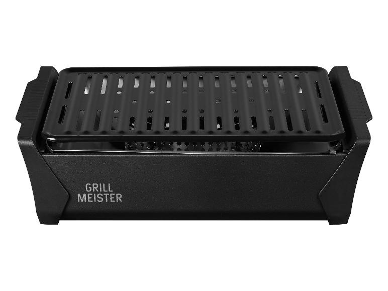 Grill Meister grill: zwarte rechthoekige barbecue met rooster.