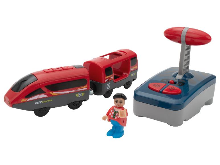 Train jouet rouge avec télécommande et petite figurine