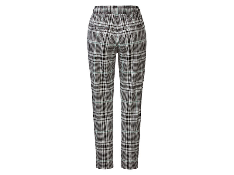 Zwarte broek met ruitjespatroon.