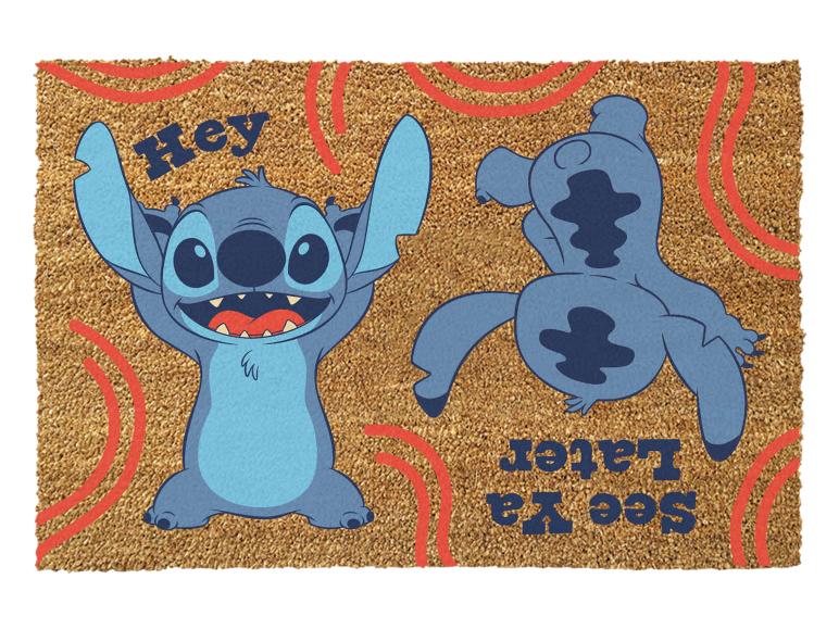 Paillasson en fibre de coco avec deux personnages de dessins animés bleus et le texte 'Hey' et 'See Ya Later'.