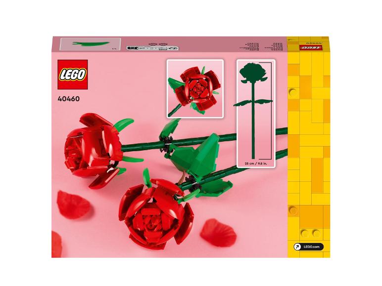Boîte LEGO avec deux roses rouges et des feuilles.