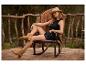 Boots et short en jean : look bohème chic.