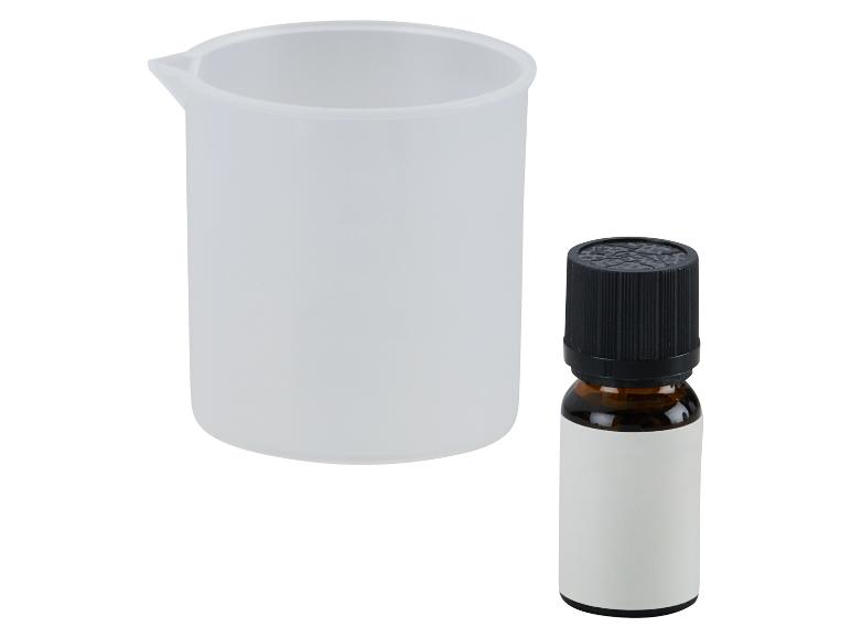 Verre doseur et flacon avec bouchon noir