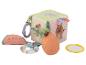 Cube d'activités en tissu avec hochet, anneau de dentition et accessoires fruits.