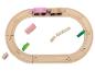Houten speelgoedtreinset met een roze trein en diverse blokken.