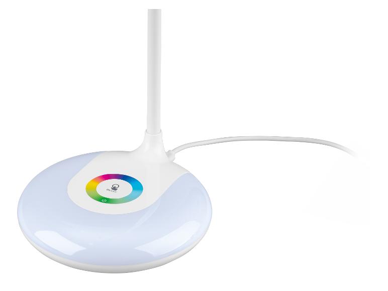 Lampe de bureau blanche avec base ronde illuminée et cercle coloré.