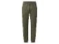 Pantalon cargo vert pour homme avec cordon de serrage à la taille et chevilles resserrées.