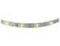 Flexibele, warmwitte LED-strip met vier brandende lampjes.