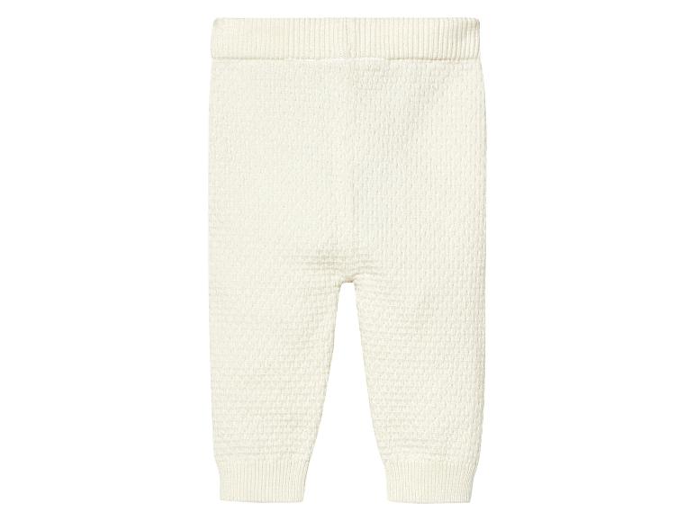 Pantalon en tricot blanc pour bébé.