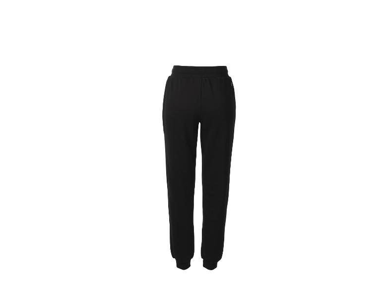 Zwarte joggingbroek met elastische tailleband en enkelboorden, achteraanzicht.
