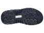 Zool van een wandelschoen met antislip profiel en een wit label.