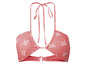 Un haut de bikini rose avec le logo 'SANSIBAR'.