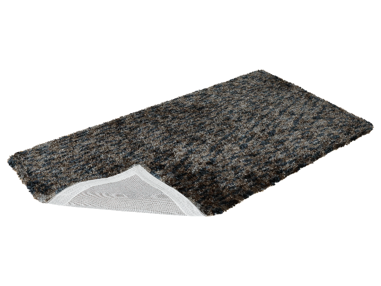 Tapis shaggy aux tons gris et bruns.