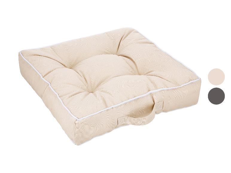 Beige vierkant zitkussen met handvat en witte bies