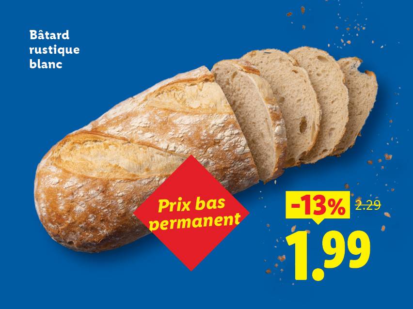 Pain bâtard rustique blanc tranché avec un autocollant rouge 'prix bas permanent' et une offre à 1,99.