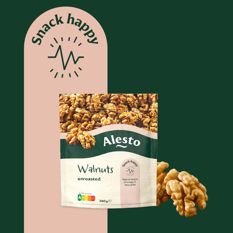 Zak ongeroosterde walnoten met de tekst 'Snack happy' en Nutri-Score A.