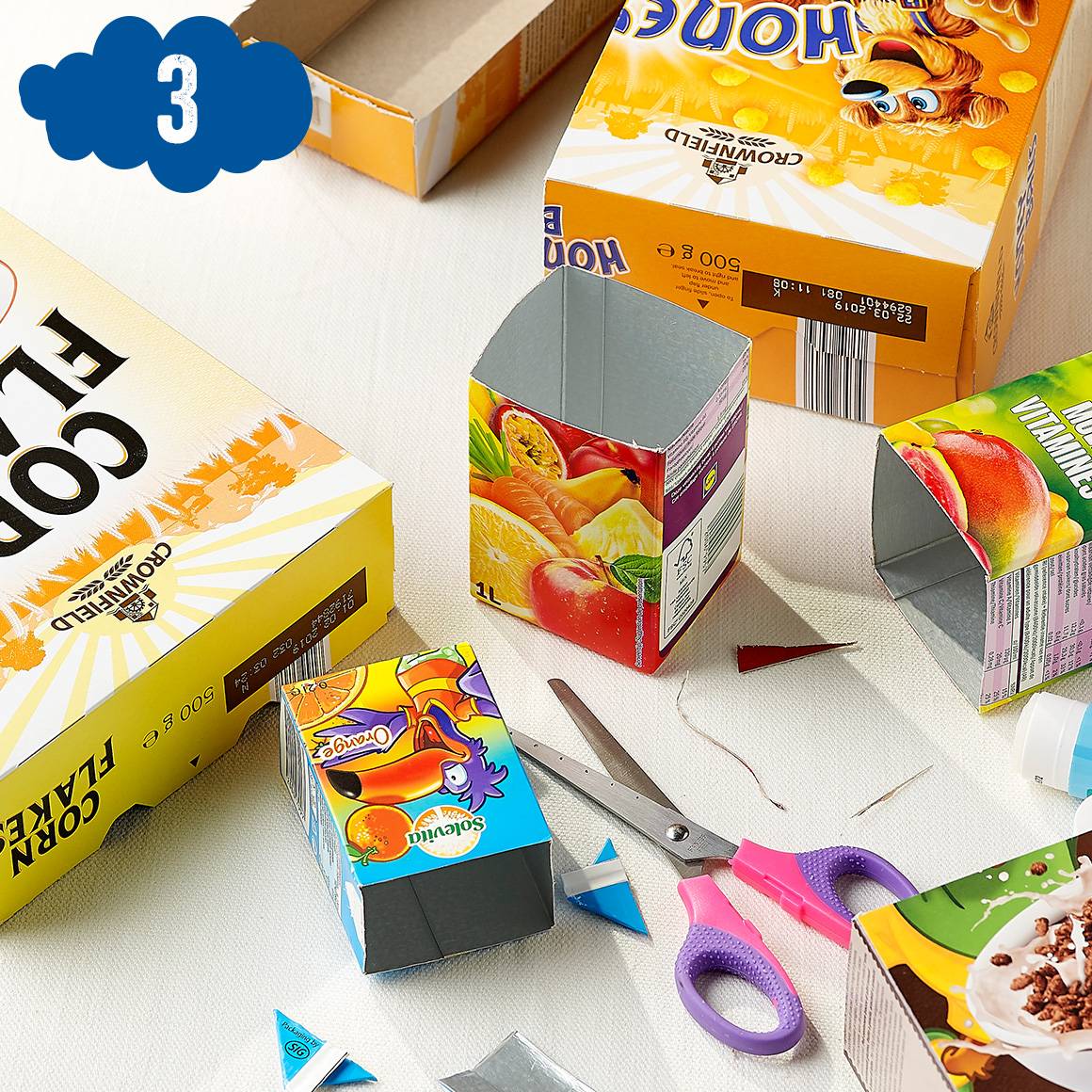 Crownfield ontbijtgranen dozen, sappakken, recycle-creaties.